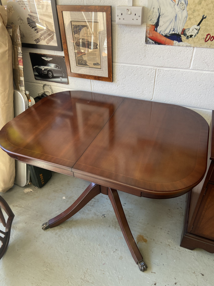 Solid wood Strongbow table and 4 chairs, slight mark ontop