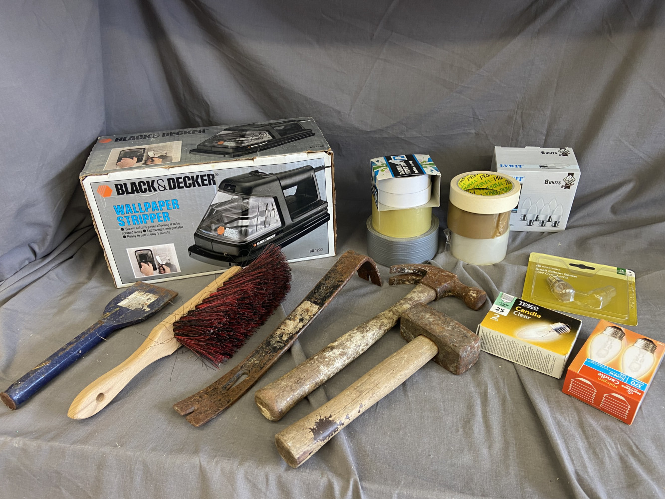 Tools, wall paper stripper, bulbs and tapes