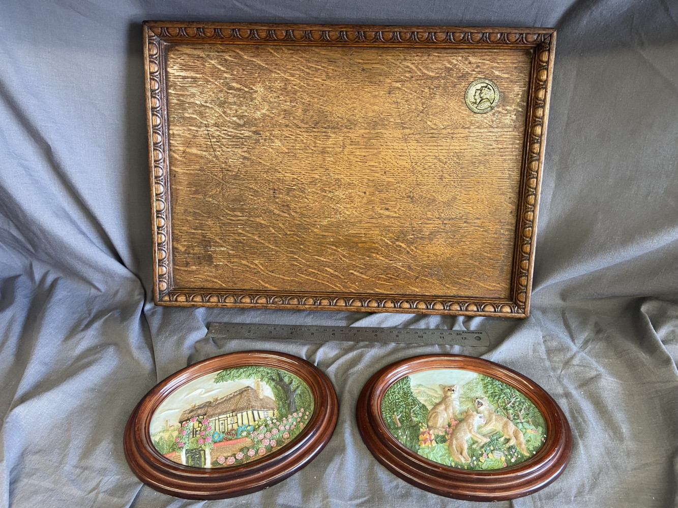 Wooden tray with inlaid coin and two plaques