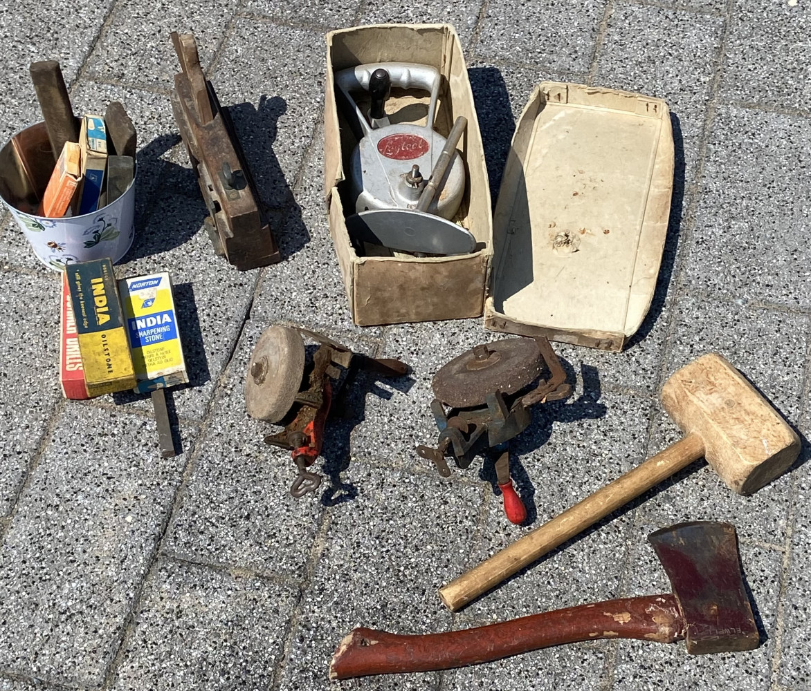 Old school mixed tools inc sharpeners and axe
