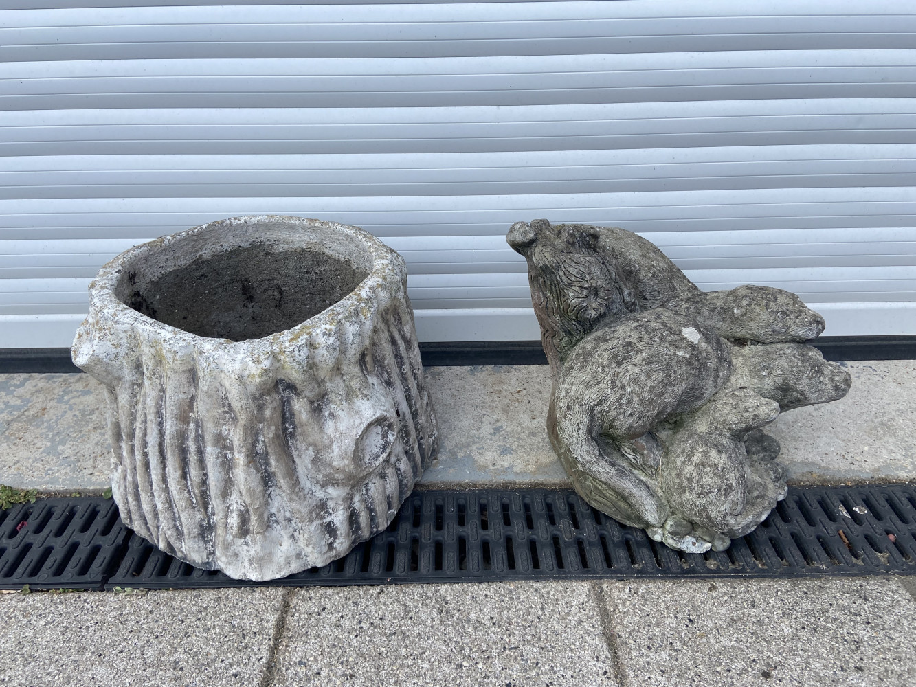 Tree stump concrete pot and otter garden ornament