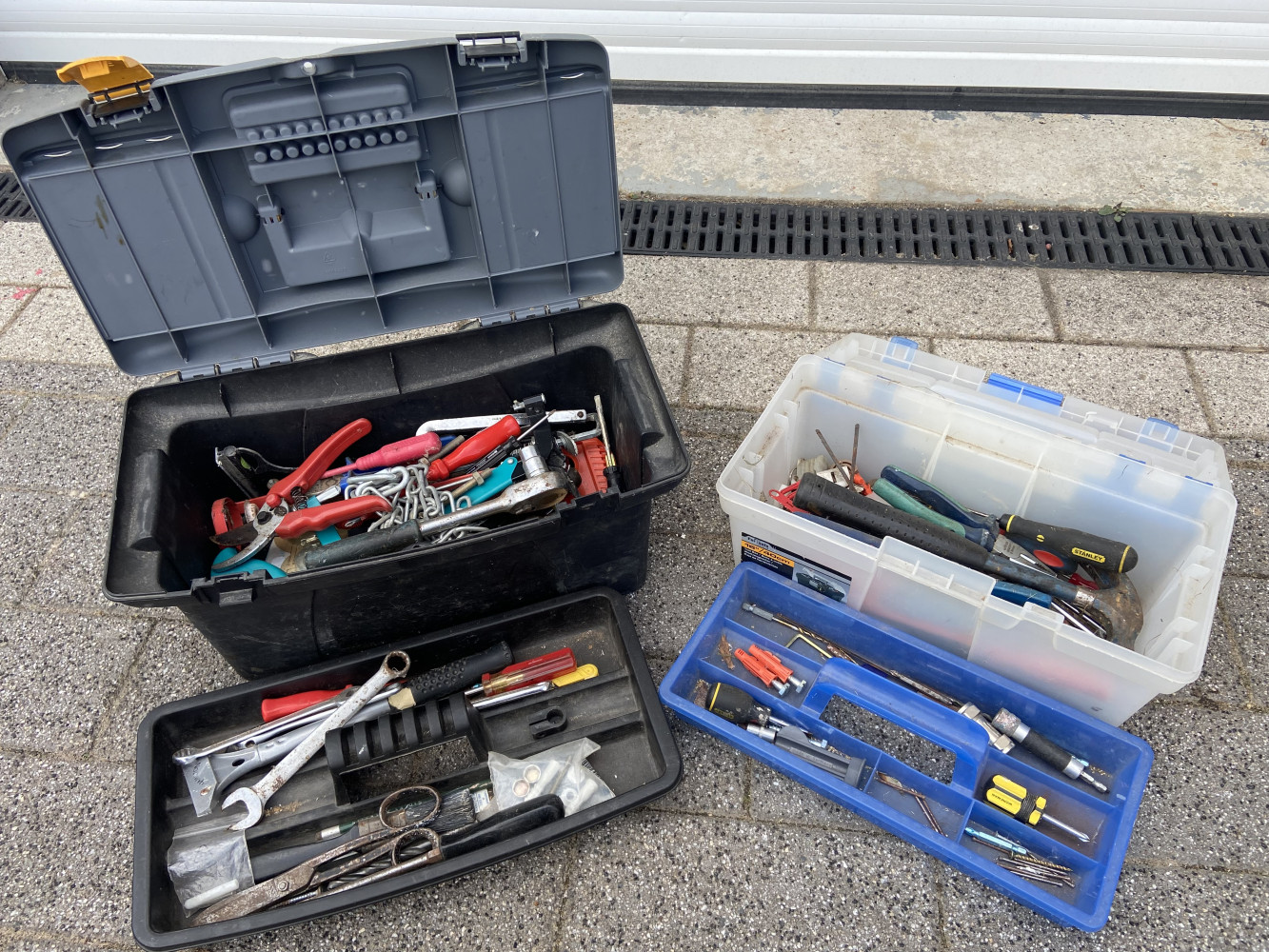 2 tool boxes with tools