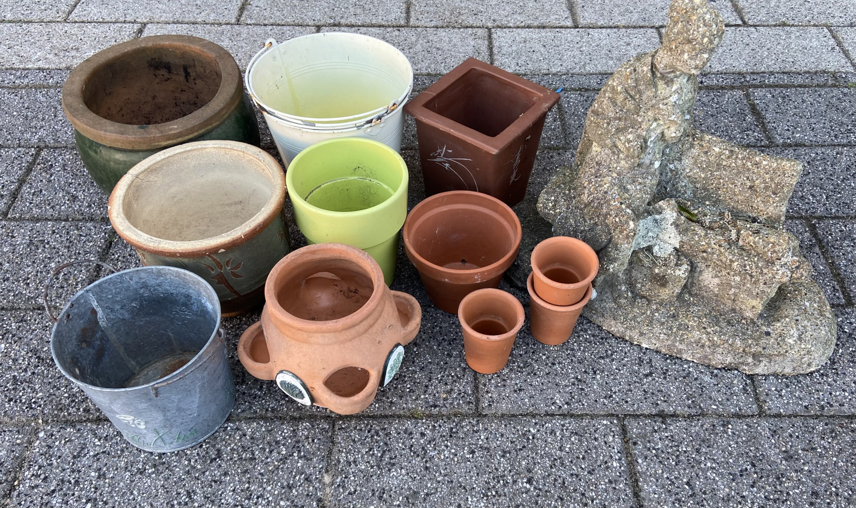 Selection of garden pots and statue