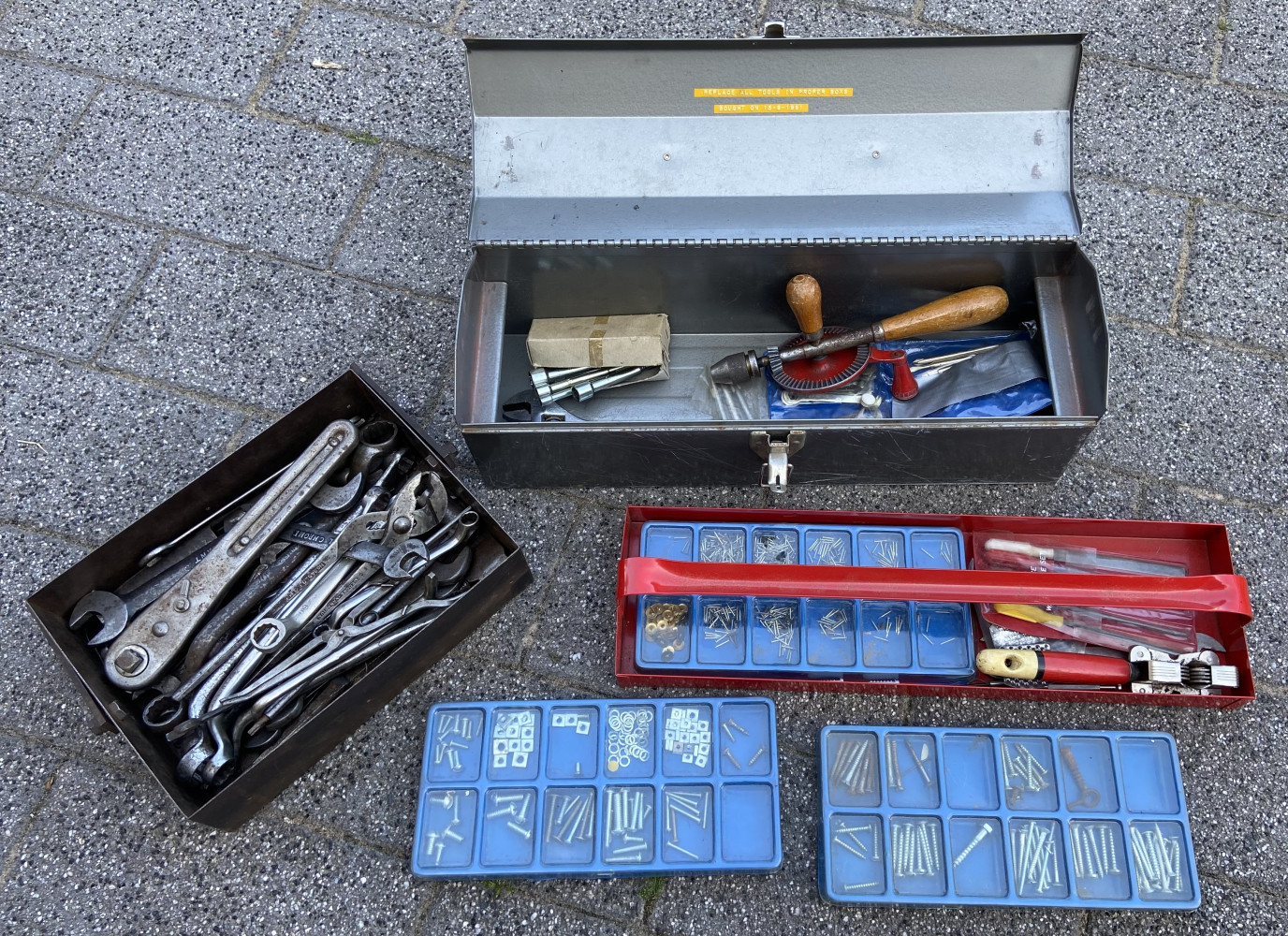 Tool box and metal tray full of tools