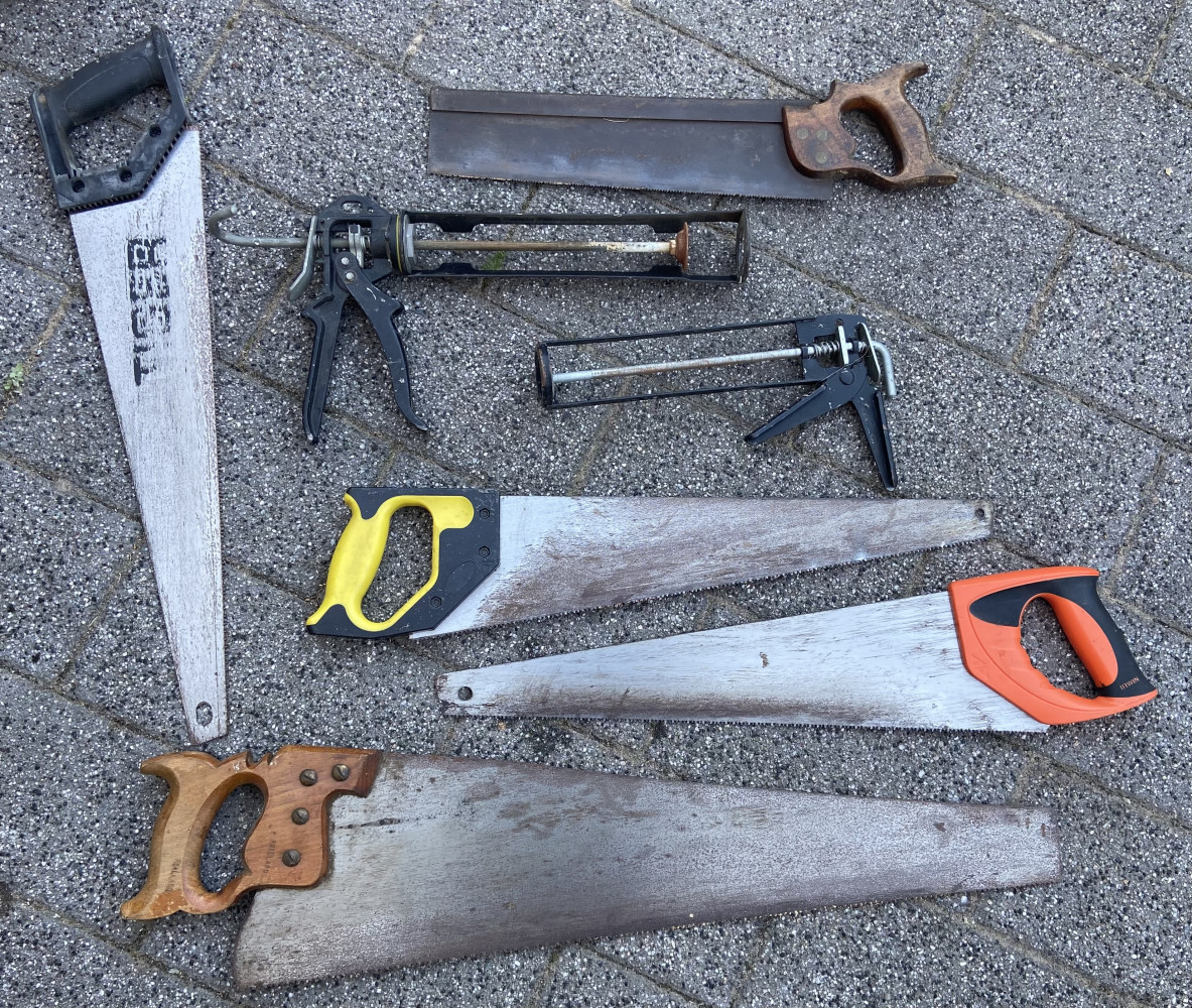 Selection of saws and mastic guns