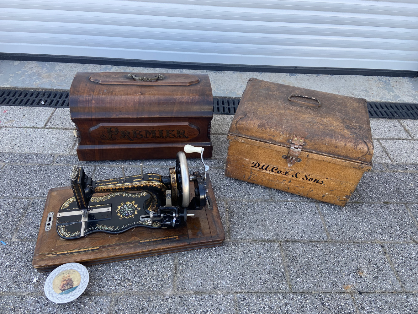 Metal trunk and Premier sewing machine