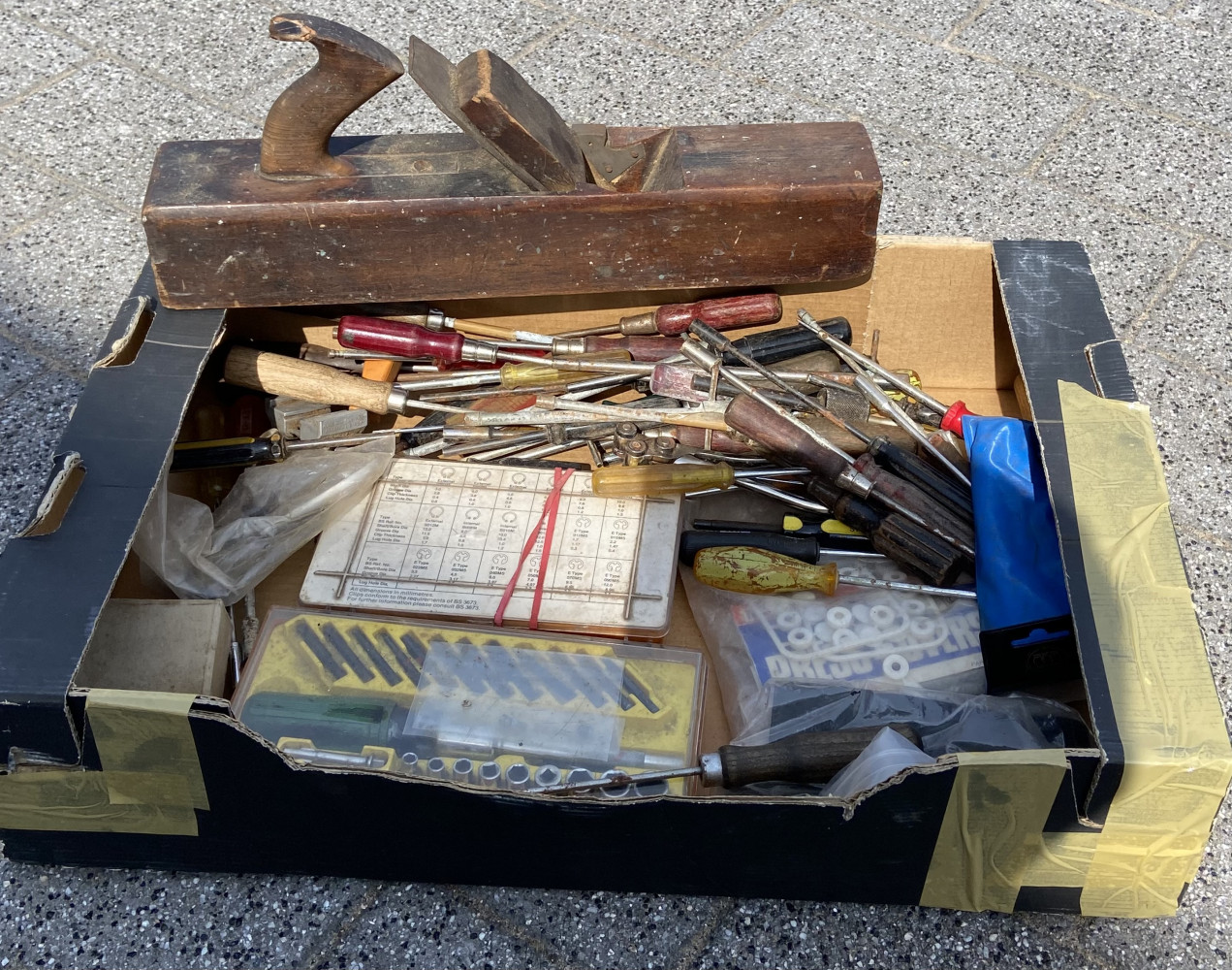 Tray of tools and fixings with large wooden plane