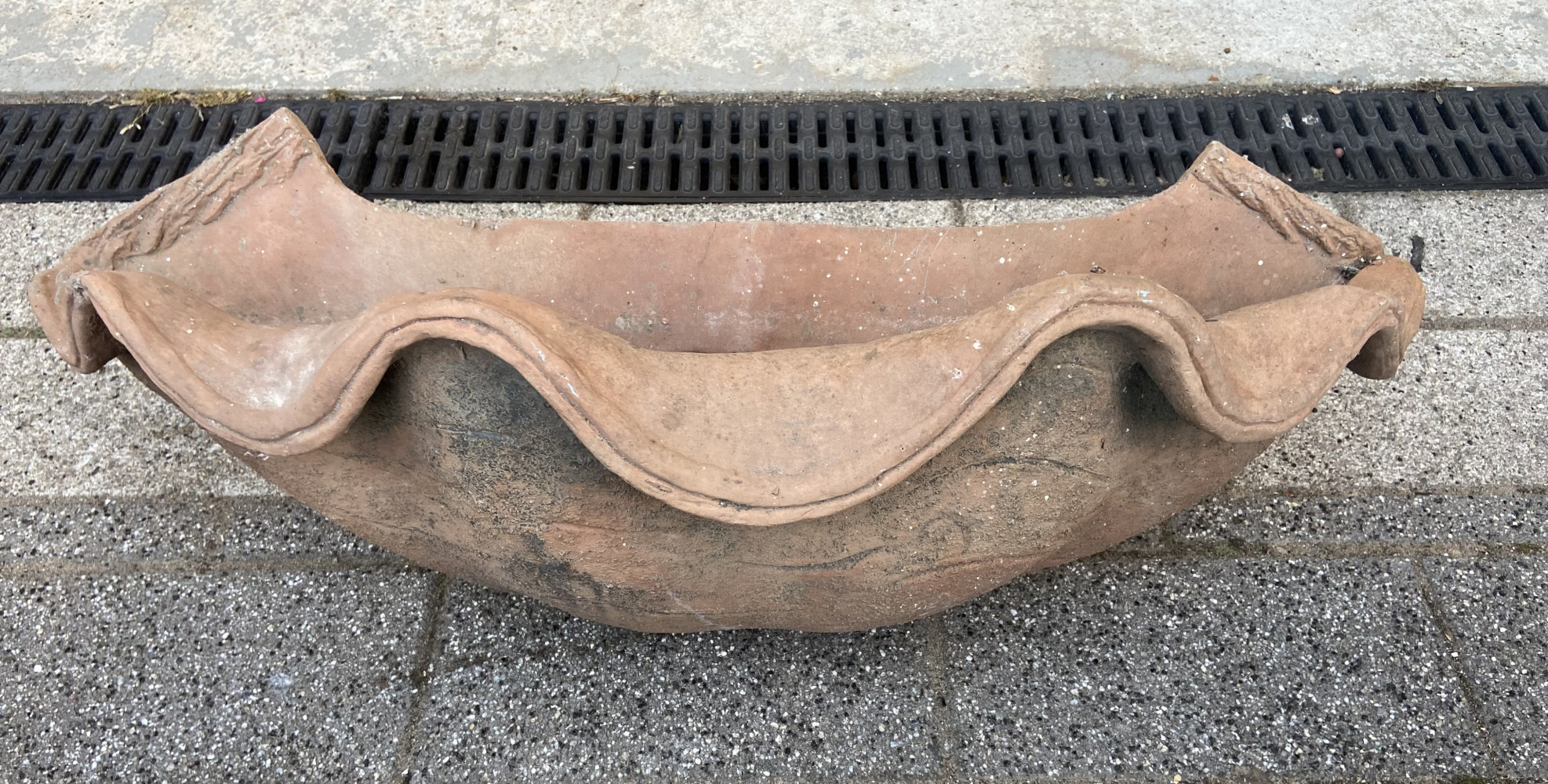 Large Terracotta wall hanger in shape of a shell 77cms